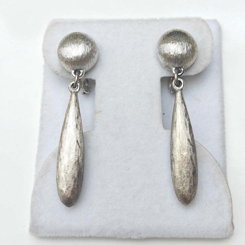Monet Vintage Silver Tone Textured Teardrop Dangle Clip On Earrings 2 Inch Long